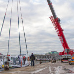 Crane lifting boat